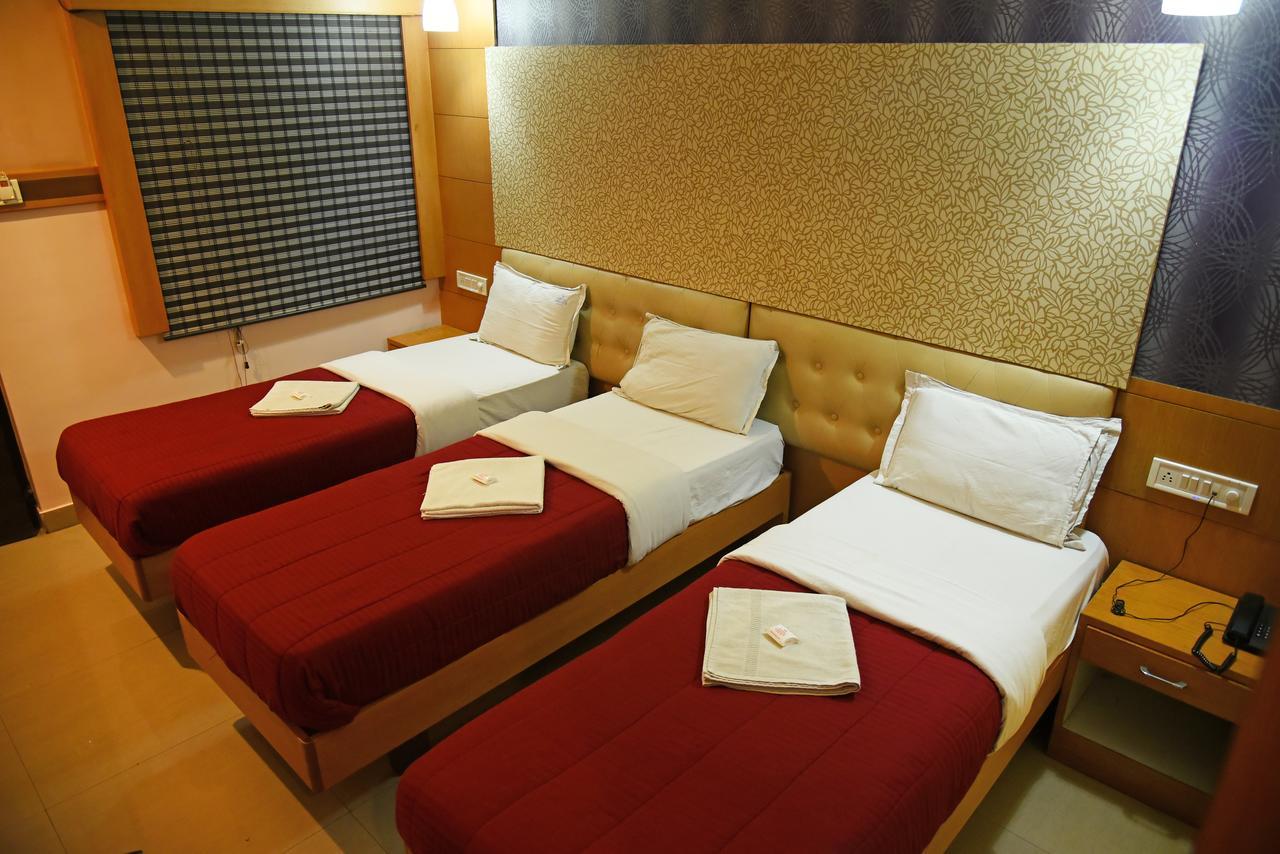 Grand Choice Hotel Bangalore Værelse billede