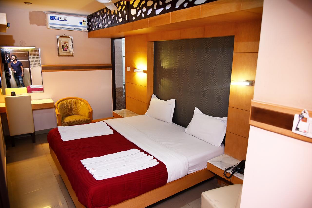 Grand Choice Hotel Bangalore Værelse billede