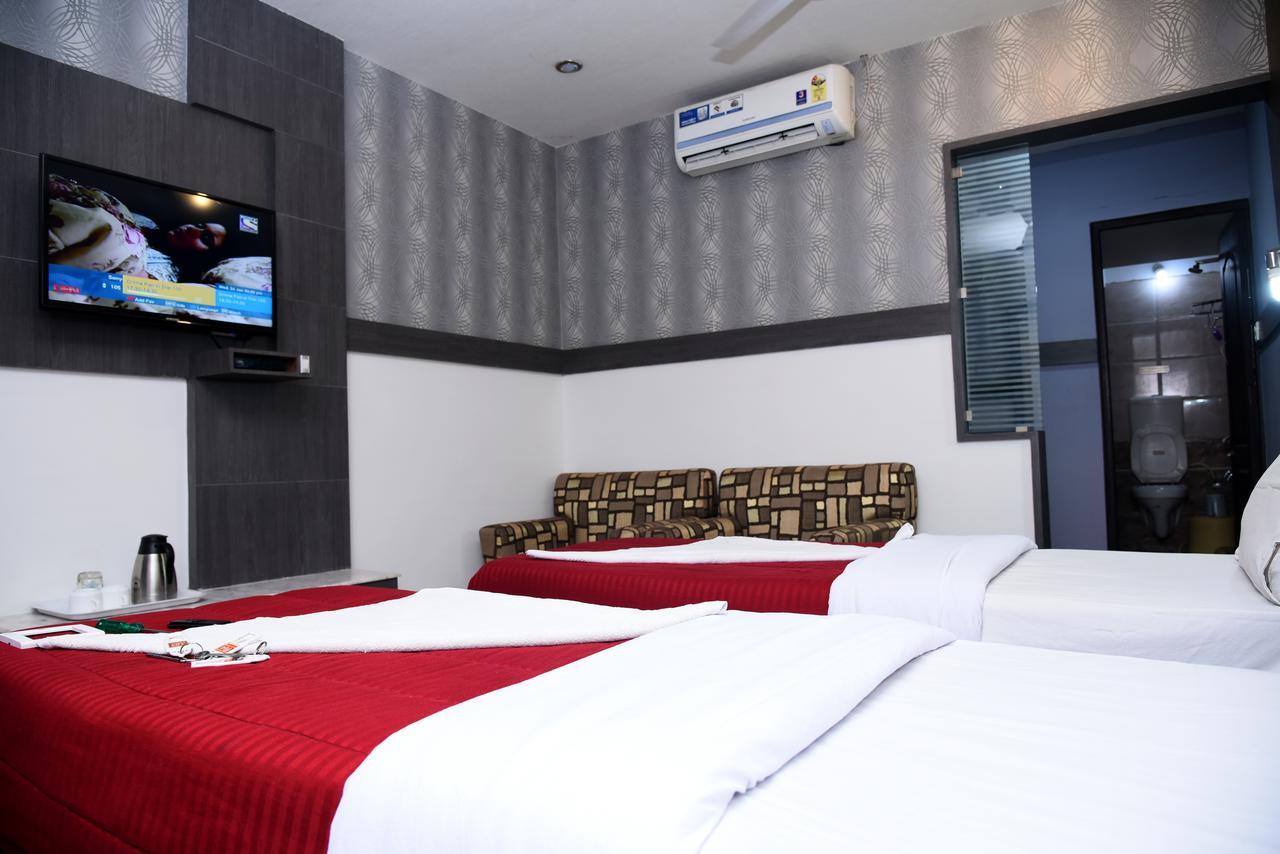 Grand Choice Hotel Bangalore Værelse billede