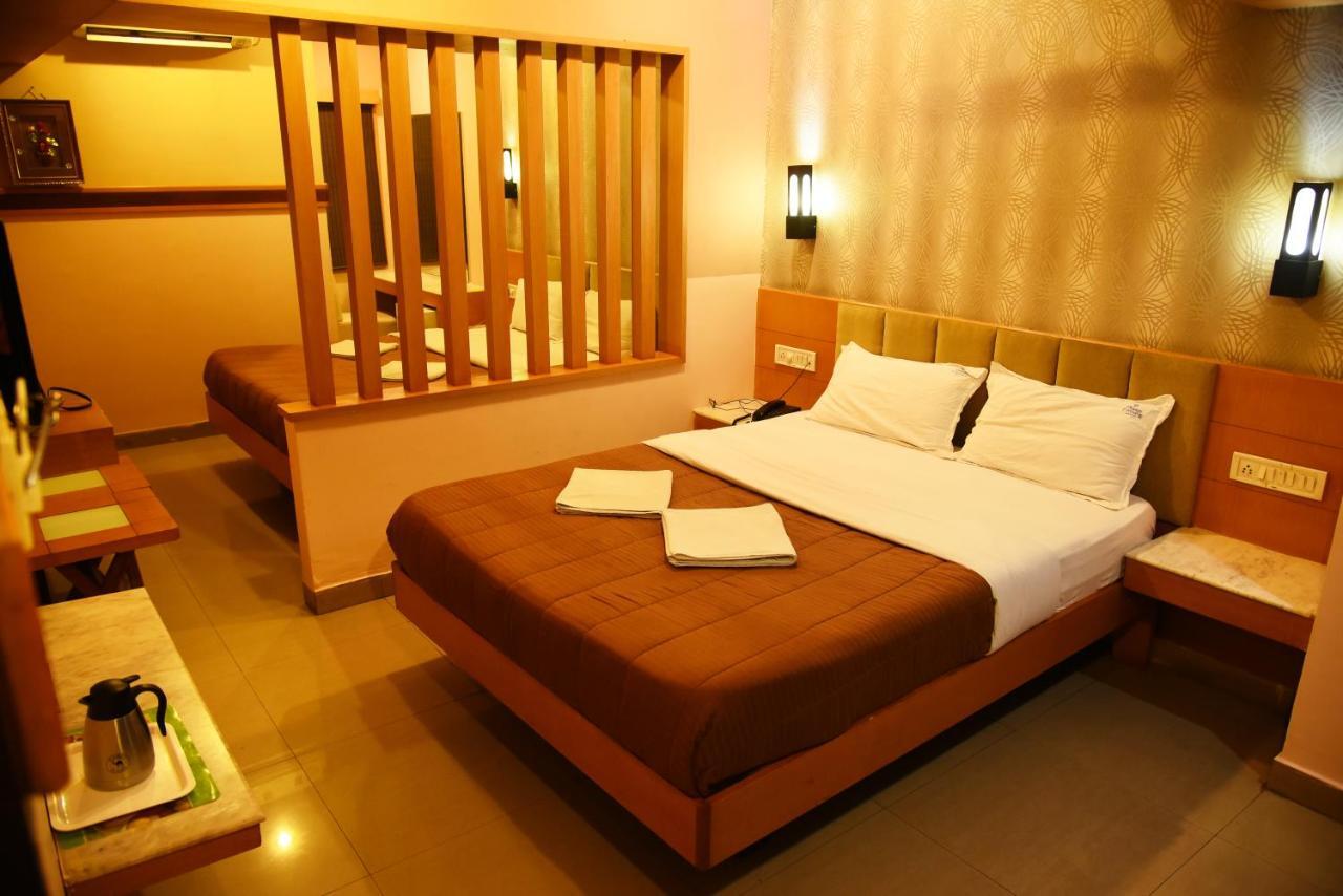 Grand Choice Hotel Bangalore Værelse billede