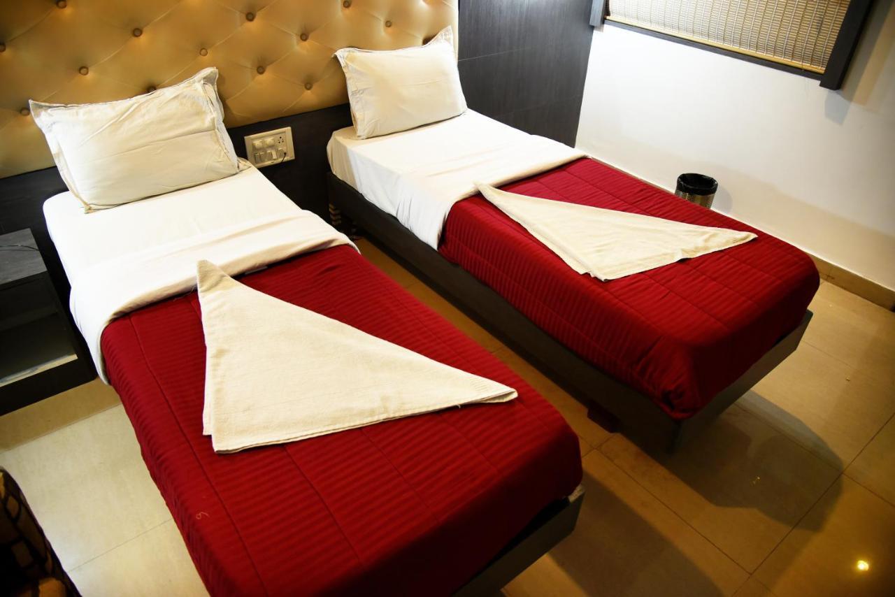 Grand Choice Hotel Bangalore Værelse billede