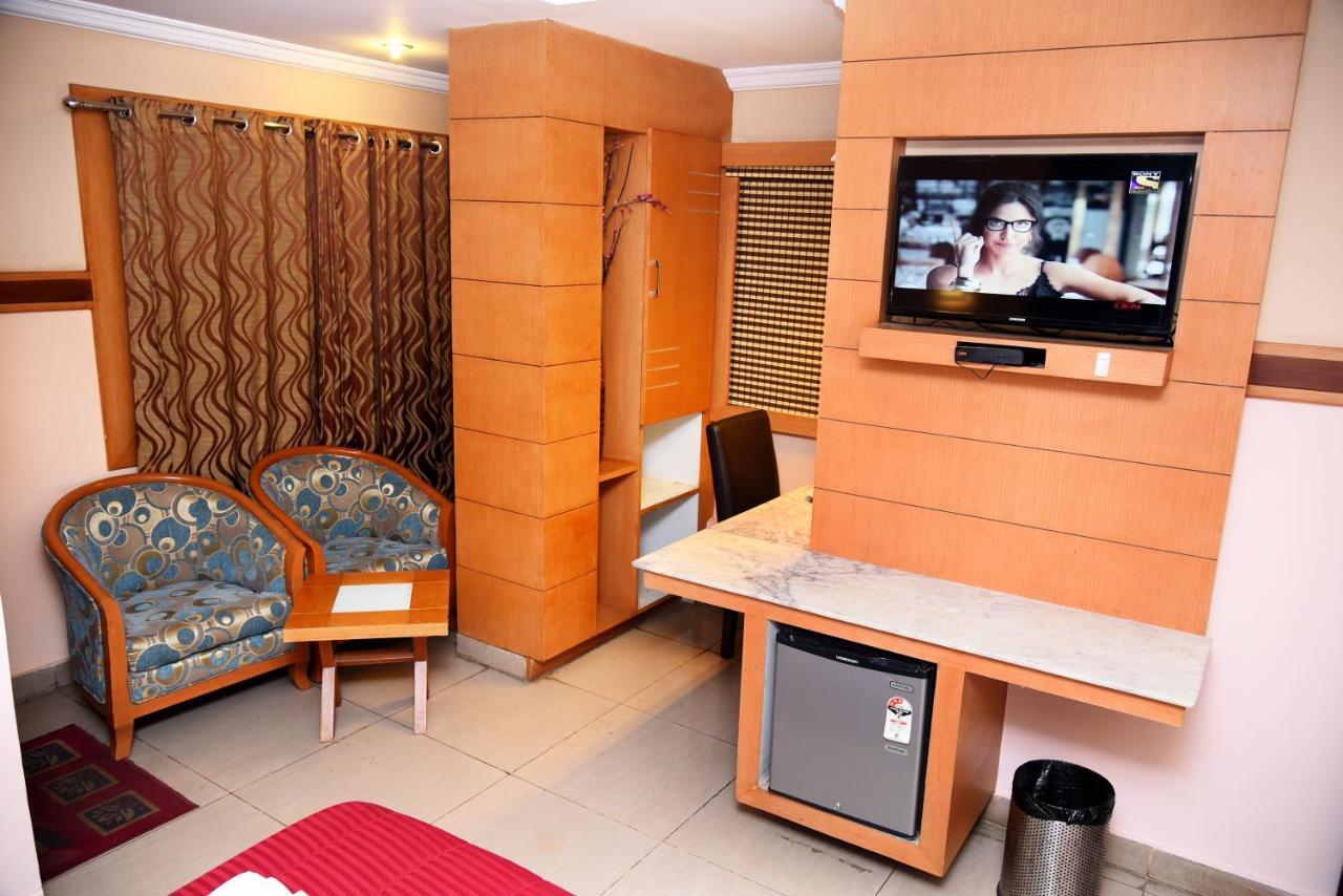 Grand Choice Hotel Bangalore Værelse billede