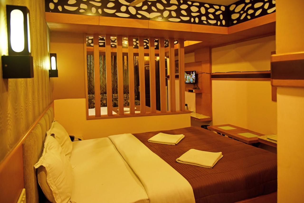 Grand Choice Hotel Bangalore Værelse billede